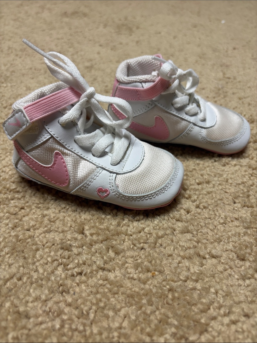 Pink Nike Baby shoes